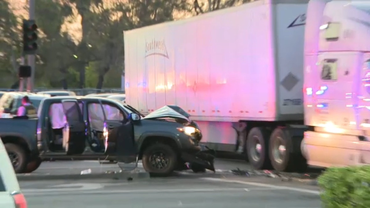 A murder suspect also wanted in connection with an alleged assault on a law enforcement officer crashed into a semi-truck Tuesday evening following a pursuit that stretched from San Diego to Los Angeles. (Courtesy: Mizael Cuatepotzo)
