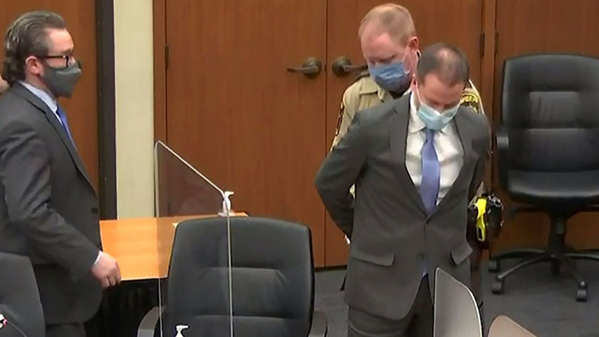 Former Minneapolis police officer Derek Chauvin is handcuffed to be led away after a jury found him guilty of all charges in his trial for second-degree murder, third-degree murder and second-degree manslaughter in the death of George Floyd in Minneapolis, Minnesota, U.S. April 20, 2021 in a still image from video.  Pool via REUTERS