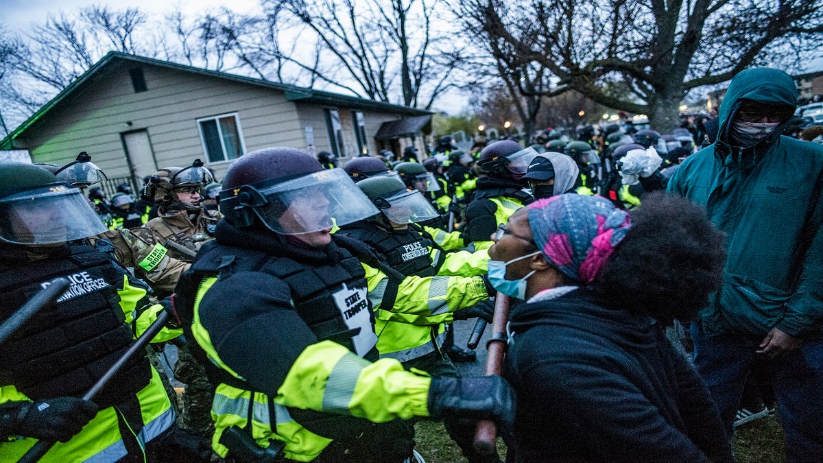 Protesters confront police over the shooting death of Daunte Wright at a rally at the Brooklyn Center Police Department on Monday. (AP/Star Tribune)