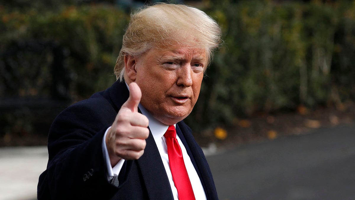 U.S. President Donald Trump thumbs up to the media after speaking about the impeachment hearings on the the South Lawn of the White House in Washington before his departure to Austin, Texas on November 20, 2019. Photo by Yuri Gripas/ABACAPRESS.COMNo Use France Digital. No Use France Print.