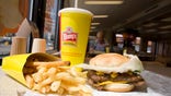 UNITED STATES - APRIL 24:  A triple cheeseburger combo is arranged for a photograph in a Wendy's restaurant in Littleton, Colorado, U.S., on Thursday, April 24, 2008. Billionaire Nelson Peltz's Triarc Cos. agreed to buy Wendy's International Inc. for about $2.4 billion to combine the third-biggest U.S. hamburger chain with his Arby's roast beef restaurants.  (Photo by Matthew Staver/Bloomberg via Getty Images)