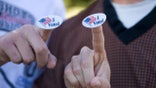 HOUSTON, Nov. 4, 2020 -- Young voters show the "I Voted" stickers after voting at a polling station in Plano, Texas, the United States, Nov. 3, 2020. (Photo by Dan Tian/Xinhua via Getty) (Xinhua/Dan Tian via Getty Images)