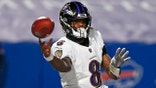 FILE - In this Jan. 16, 2021, file photo, Baltimore Ravens quarterback Lamar Jackson throws a pass during the first half of an NFL divisional round football game against the Buffalo Bills in Orchard Park, N.Y. The Ravens have exercised the fifth-year option for Jackson, the team announced Friday, April 30, 2021. (AP Photo/John Munson, File)