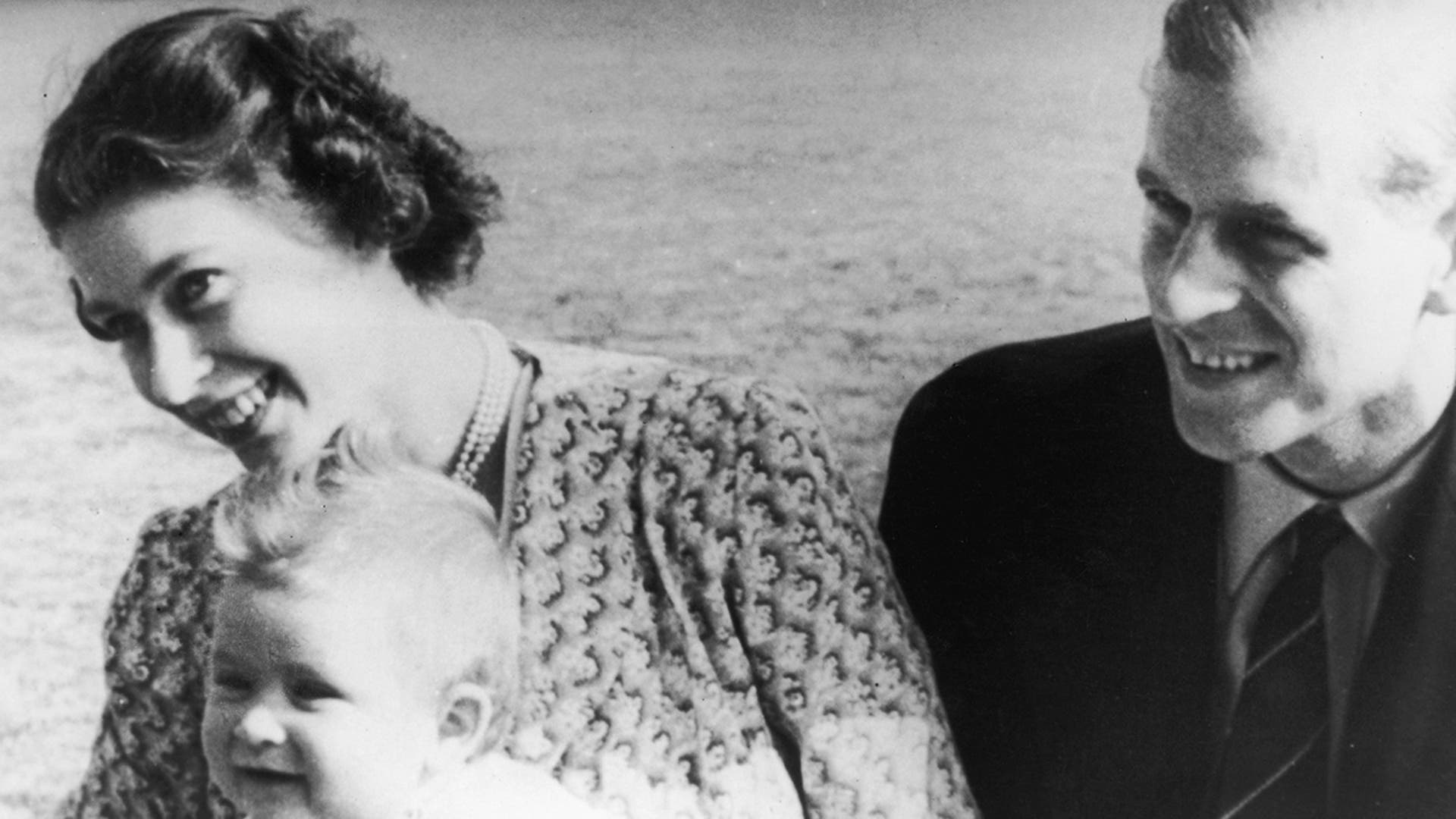 Princess Elizabeth (later Queen Elizabeth II of Great Britain) with her husband Prince Philip, Duke of Edinburgh and their baby son Prince Charles, July 1949. (Photo by Fox Photos/Hulton Archive/Getty Images)