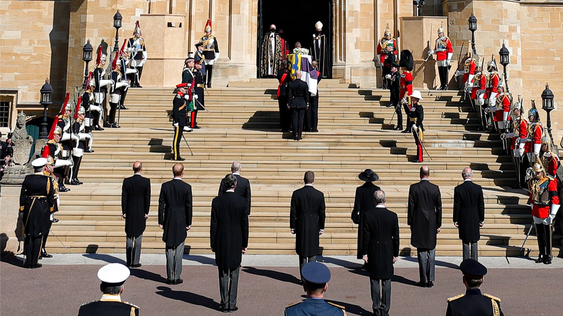A minute of silence is observed at St George's Chapel for the funeral of Britain's Prince Philip inside Windsor Castle in Windsor, England, Saturday, April 17, 2021. (Kirsty Wigglesworth/Pool via AP)