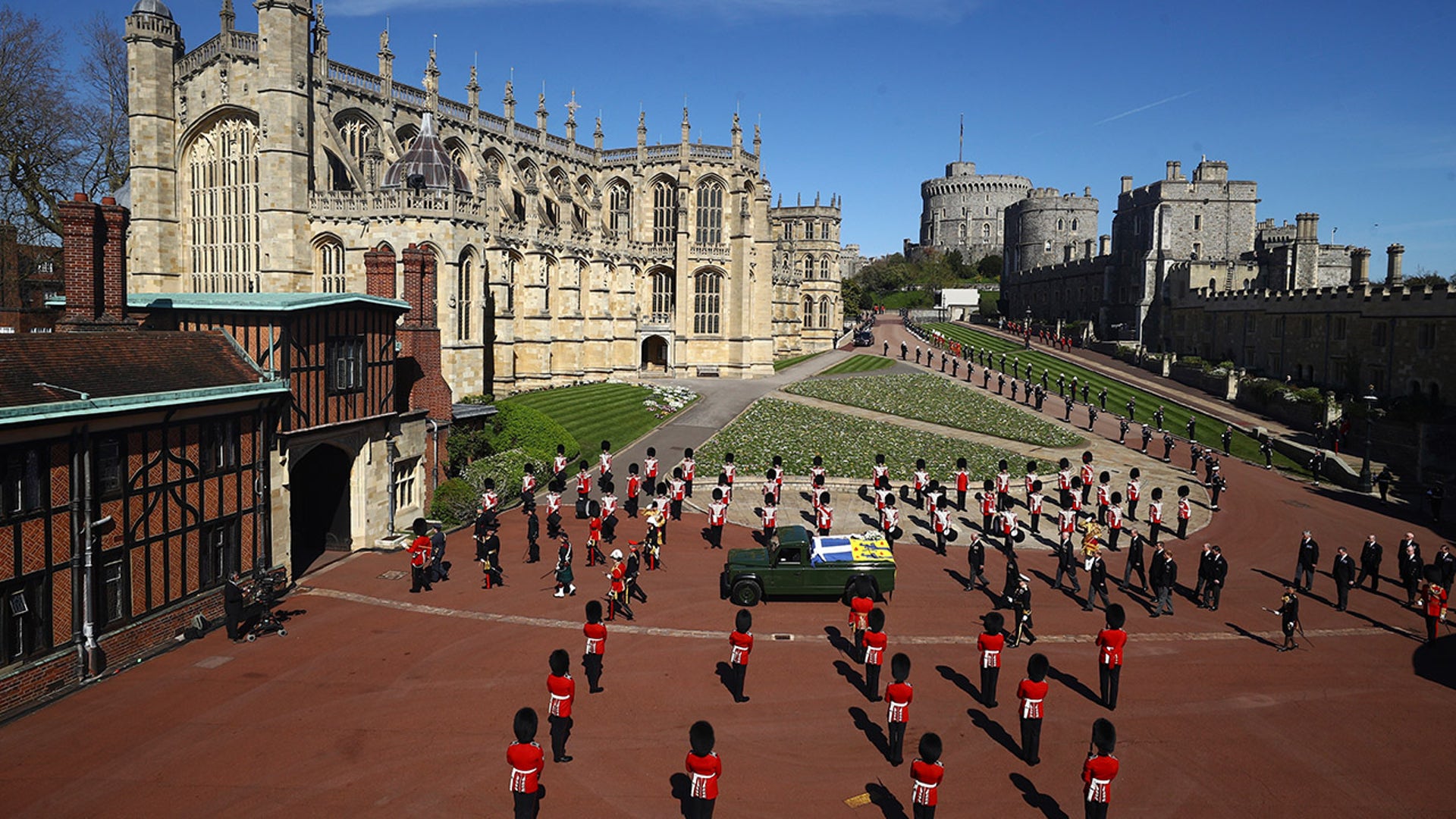 Members of the royal family follow the coffin of Prince Philip during the funeral at Windsor Castle on Saturday. Philip died April 9 at the age of 99 after 73 years of marriage to Queen Elizabeth II. (Hannah McKay/Pool via AP)