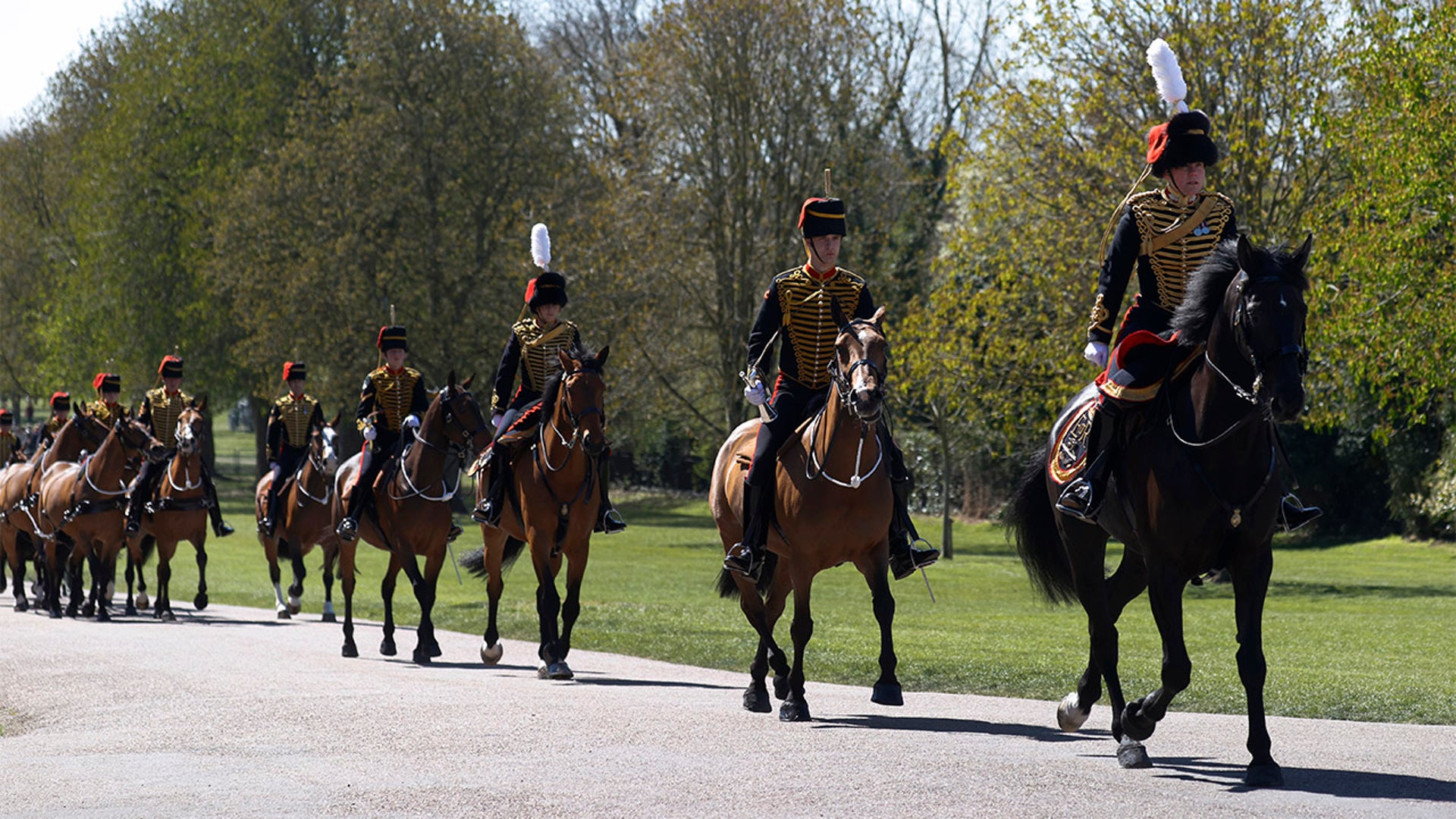 Officers of The King's Troop Royal Horse Artillery arrive for the Gun Salute at the funeral of Britain's Prince Philip at Windsor Castle in Windsor, England on Saturday, April 17, 2021. Prince Philip died April 9 at the age of 99 after 73 years of marriage to Queen Elizabeth II. (Phil Noble/Pool via AP)