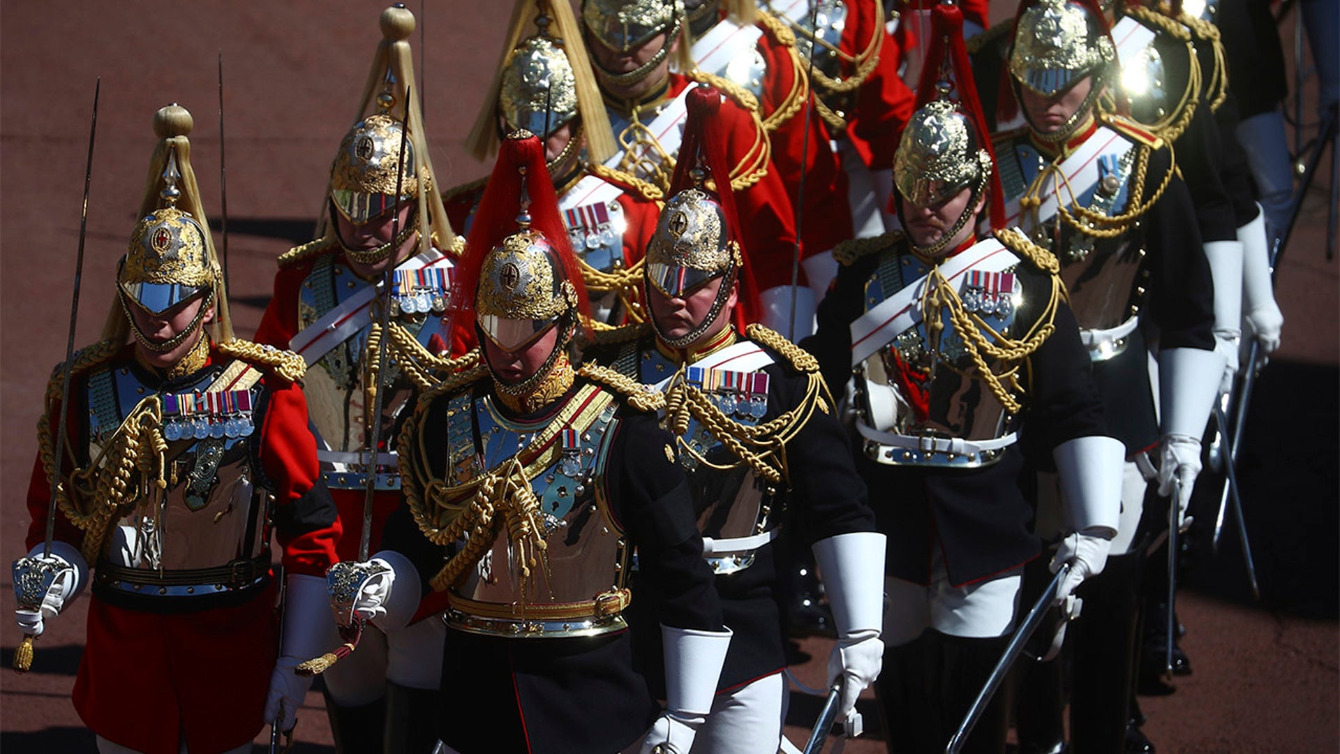 Soldiers arrive at Windsor Castle ahead of the funeral of Britain's Prince Philip in Windsor, England, Saturday, April 17, 2021. Prince Philip died April 9 at the age of 99 after 73 years of marriage to Britain's Queen Elizabeth II. (Hannah McKay/Pool via AP)