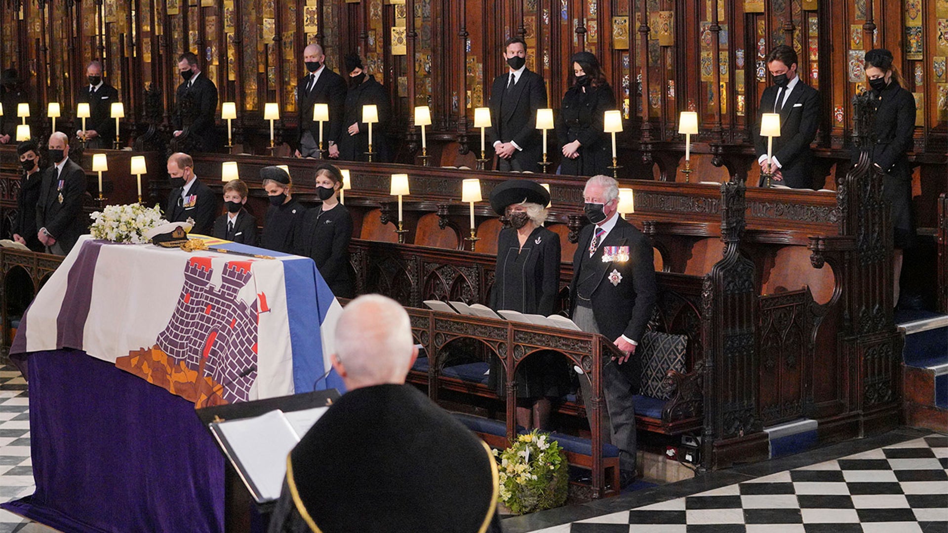 Mourners including, front row from left, Kate, Duchess of Cambridge, Prince William, Prince Edward, Viscount Severn, Lady Louise Mountbatten-Windsor, Sophie, Countess of Wessex, Camilla, Duchess of Cornwall and Prince Charles during the funeral of Prince Philip at St George's Chapel in Windsor Castle on Saturday. Philip died April 9 at the age of 99 after 73 years of marriage to Queen Elizabeth II. Back row, from left, the Earl of Snowdon, Peter Phillips, Mike Tindall, Zara Tindall, Jack Brooksbank, Princess Eugenie, Edoardo Mapelli Mozzi and Princess Beatrice. (Dominic Lipinski/Pool via AP)