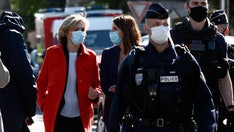 French officials open terror probe after police officer fatally stabbed, attacker shot dead