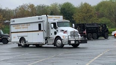 Maryland police report being shot at after responding to call, manhunt underway