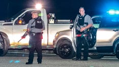 Georgia officers shot during police chase; 1 suspect dead, another in custody, officials say