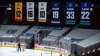 Canucks identity source of COVID outbreak as 21 players test positive