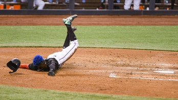 Marte helps Marlins rally for 1st win, 12-7 over Rays