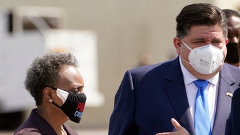 Illinois' Pritzker signs firefighter pension bill that Lightfoot slams as 'backroom' deal