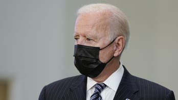 Biden leans close to tell someone to socially distance, 'which I'm not doing'
