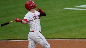 Naquin stars as Reds pound Pirates for 4th straight win