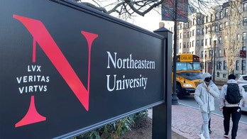 Ex-Northeastern track coach charged with nude photo scheme