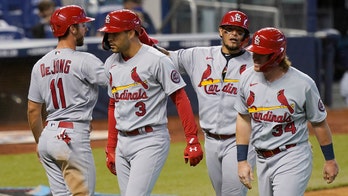 Molina HR, Carlson slam lead Cards over Marlins 7-0 & sweep