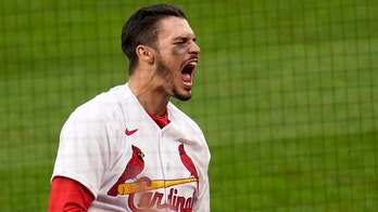 Arenado's late HR lifts Cards over Brewers in home debut