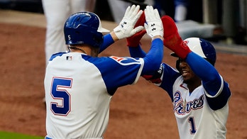 Freeman homers, drives in 3 as Braves edge Phillies 5-4