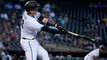 Lowrie, A's rally from 5-run deficit, beat Diamondbacks 7-5