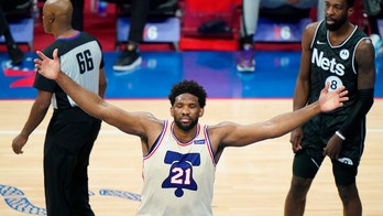Embiid, 76ers top undermanned Nets 123-117 for 1st in East