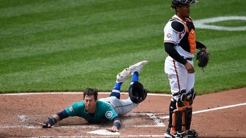 Crawford lifts Mariners over O's 4-2 in doubleheader opener