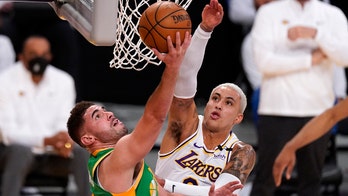Lakers hold off NBA-leading Jazz 127-115 in OT