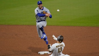 Betts makes diving grab as Dodgers beat Padres 2-0