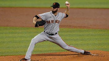 Wood, 4 relievers help Giants 3-hit Marlins in 1-0 win