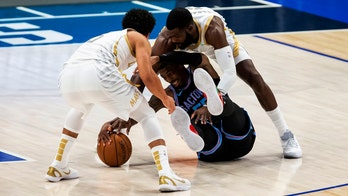 Kings snap 9-game losing streak, beat Mavericks 121-107