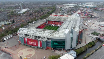 Liverpool, Man United fans protest against American owners