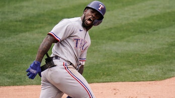 García's 3-run homer in 8th sends Rangers past Angels 7-4
