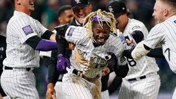 Tapia's solo HR in 9th lifts Rockies over Phillies 5-4