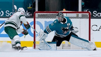 Wild clinch playoffs with 6-3 win over Sharks
