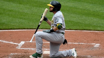 Oakland's 13-game winning streak ends, Orioles romp 8-1