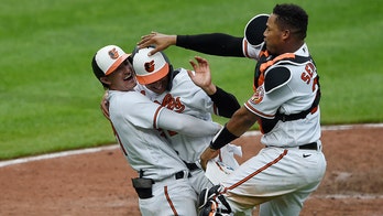 Mullins' sac fly propels Orioles past Yankees 4-3 in 10