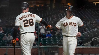 Posey hits 2-run homer, Giants pound Rockies in 12-0 rout