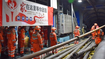 21 Chinese coal miners trapped by underground flood