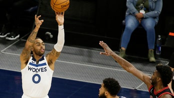 Towns, Russell push Wolves to 121-117 win against Bulls