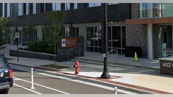 North Carolina protesters start fire outside police headquarters, smash windows