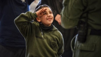 Illinois 7-year-old with life-threatening heart condition becomes SWAT officer for a day