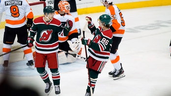 Devils snap 10-game skid in wild, 6-4 win over Flyers