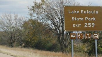 Woman, 2 children found dead inside partially submerged car