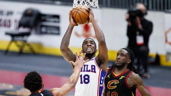Sixers end trip without Embiid by beating Cavs 114-94