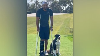 Tiger Woods posts photo on crutches in first image of himself since car crash