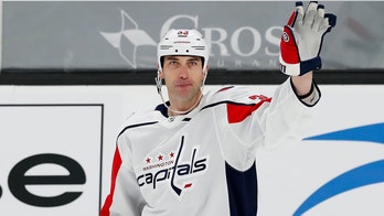 Caps roll 8-1 in Chara's 1st game in front of Bruins fans