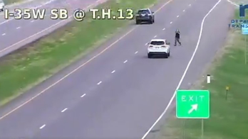 Minnesota armed carjacker points gun at vehicle during police pursuit, chilling video shows