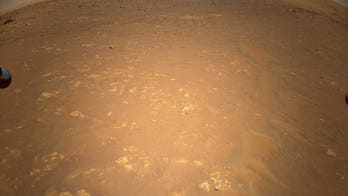 Ingenuity Mars helicopter captures Perseverance rover in unprecedented aerial shot